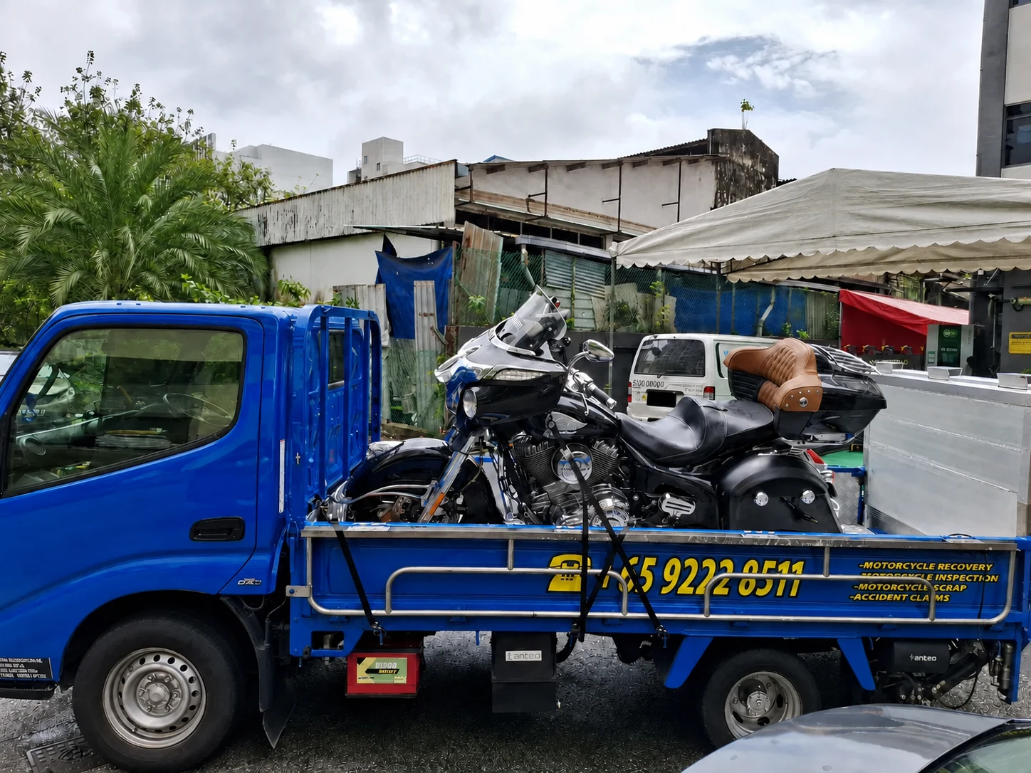 Siva Towing motorcycle recovery lorry carrying two motorcycles in Singapore
